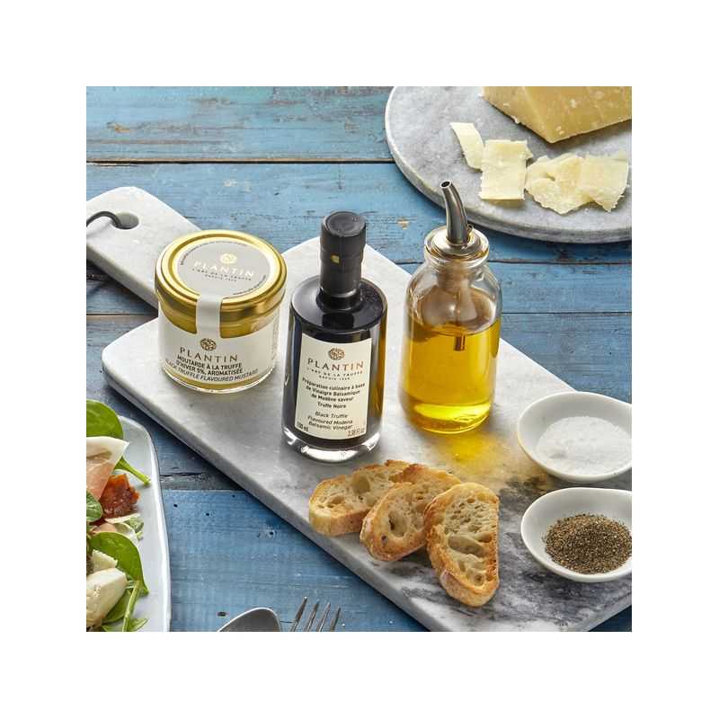 Preparazione culinaria a base di aceto balsamico di Modena al gusto di tartufo nero